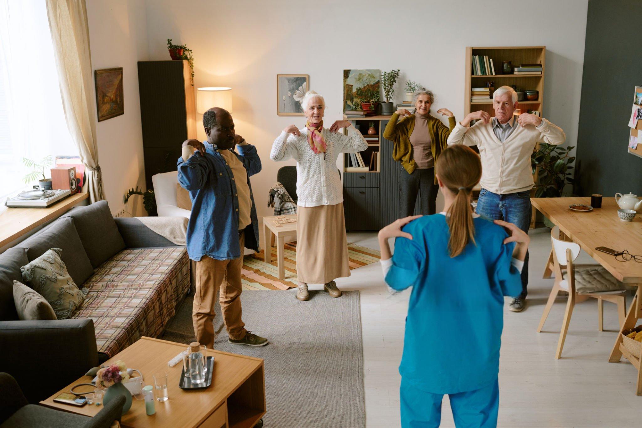 SIA Healthcare caregivers and clients doing exercise together